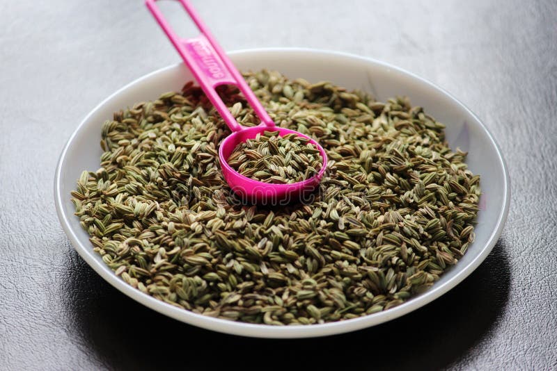 Cumin seeds isolated on a black background stock photo Cumin seeds isolated on a black background stock photo