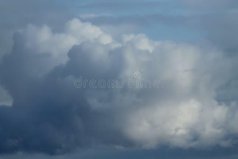 Cumulus white-gray clouds against the blue sky. stock image Cumulus white-gray clouds against the blue sky. stock image