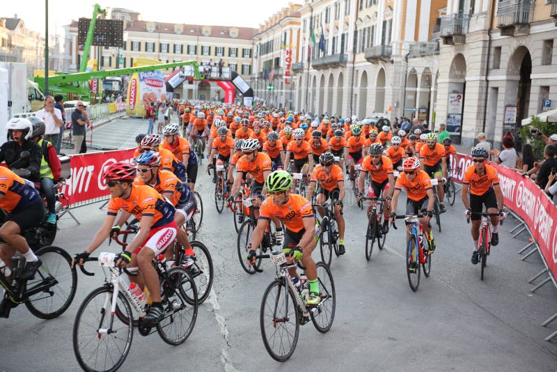 CUNEO, ITALY - JULY 10, 2016: a group of cyclists at the start o royalty free stock photography CUNEO, ITALY - JULY 10, 2016: a group of cyclists at the start o royalty free stock photography