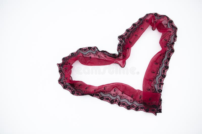 Cuore del pizzo del biglietto di S. Valentino fotografia stock libera da diritti Cuore del pizzo del biglietto di S. Valentino fotografia stock libera da diritti