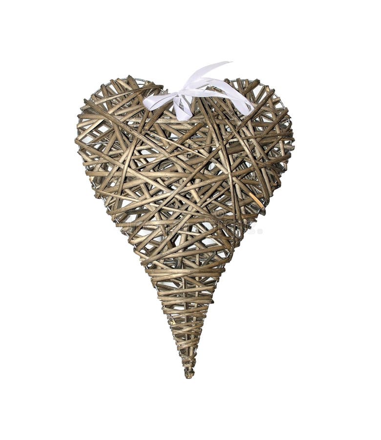 Cuore del rattan di Brown con l'arco bianco immagine stock