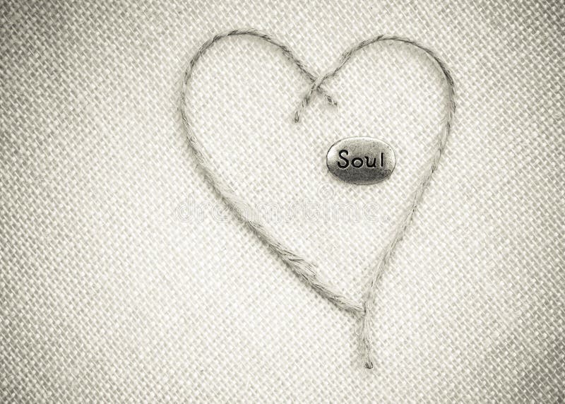 Cuore ed anima su tela da imballaggio immagine stock libera da diritti Cuore ed anima su tela da imballaggio immagine stock libera da diritti
