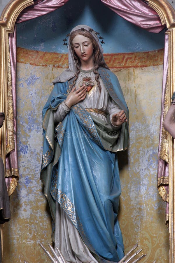 O Cuore Immacolato Di Maria Ardente Di Bontà Cuore immacolato di Mary fotografia stock. Immagine di limite - 114471544