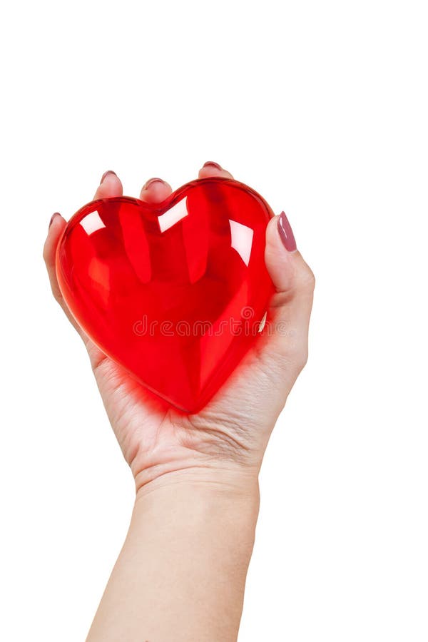 Cuore nelle mani isolate su fondo bianco immagine stock Cuore nelle mani isolate su fondo bianco immagine stock