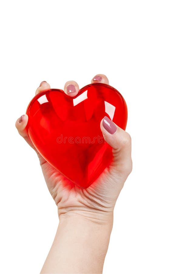 Cuore nelle mani isolate su fondo bianco fotografia stock Cuore nelle mani isolate su fondo bianco fotografia stock