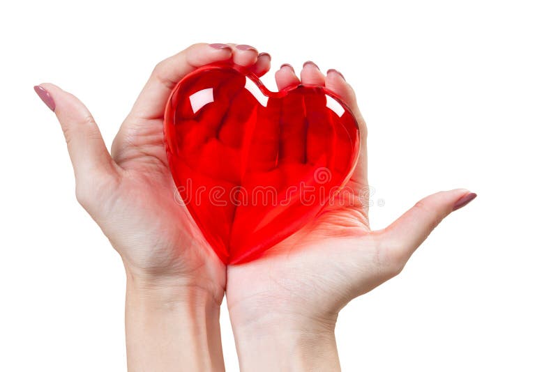 Cuore nelle mani isolate su fondo bianco fotografia stock libera da diritti Cuore nelle mani isolate su fondo bianco fotografia stock libera da diritti