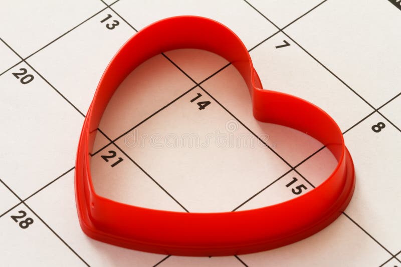 Cuore sul calendario fotografia stock Cuore sul calendario fotografia stock