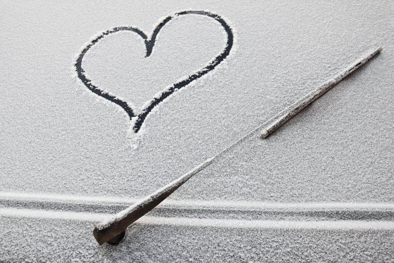 Cuore sull'auto fotografia stock