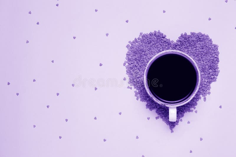 Cup of black coffee and pink hearts in ultraviolet style. St valentine`s day concept, woman`s day. top view, flat lay. stock images Cup of black coffee and pink hearts in ultraviolet style. St valentine`s day concept, woman`s day. top view, flat lay. stock images