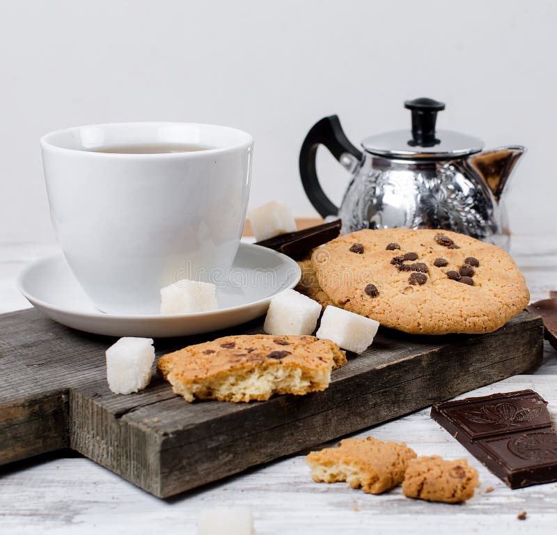 Cup of Tea, Biscuits on White Wooden Table Stock Photo - Image of ...