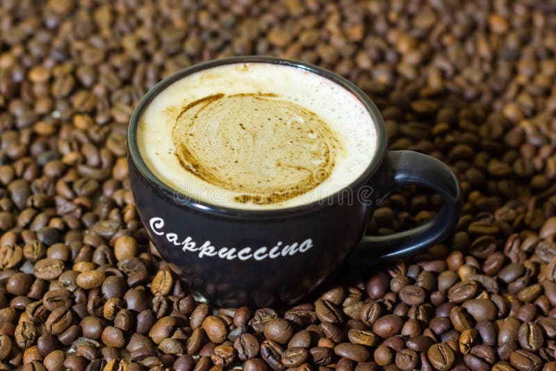 Cup of Cappuccino on Coffee Beans Stock Image Image of gourmet