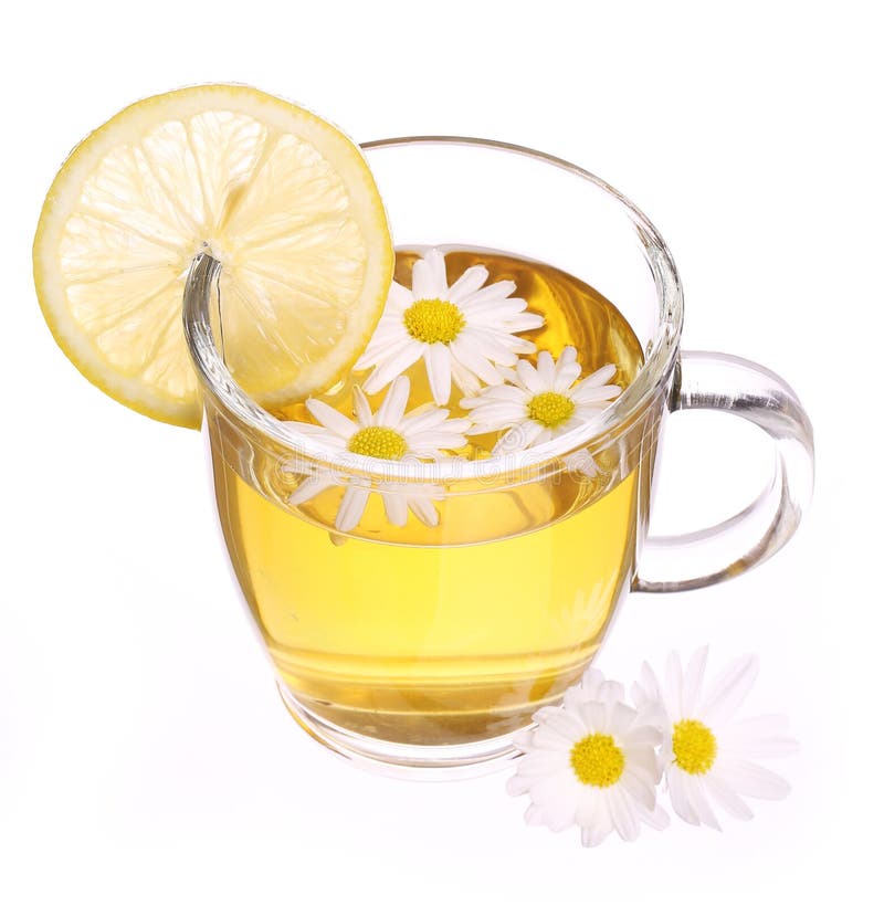 Cup of Chamomile Tea with Chamomile Flowers and Lemon Isolated Stock