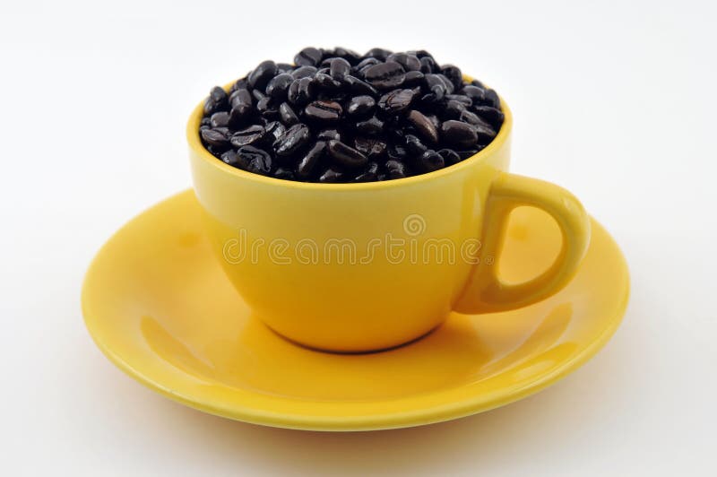 Cup with coffe beans