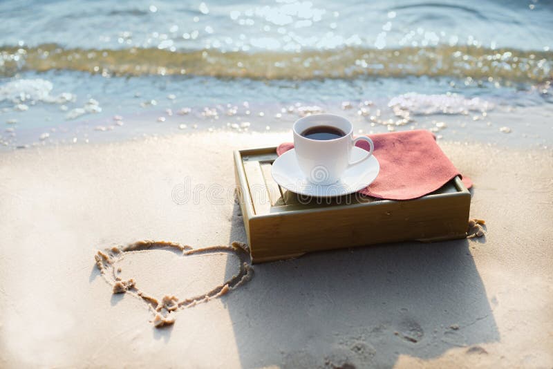 Cup of coffee at the beach royalty free stock image Cup of coffee at the beach royalty free stock image