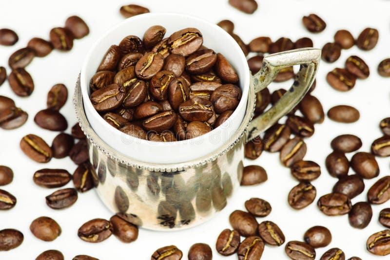 Cup of coffee beans stock image. Image of conceptual 97603123