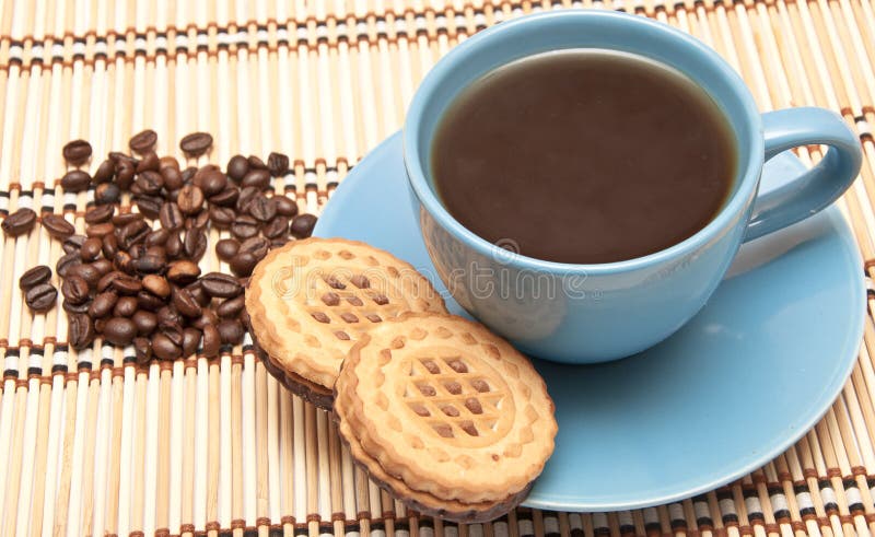 Cup of coffee with biscuits