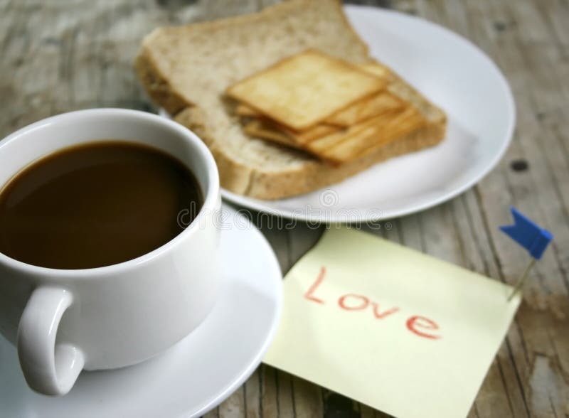 A cup of coffee and bread stock photo. Image of caffeine 36399586