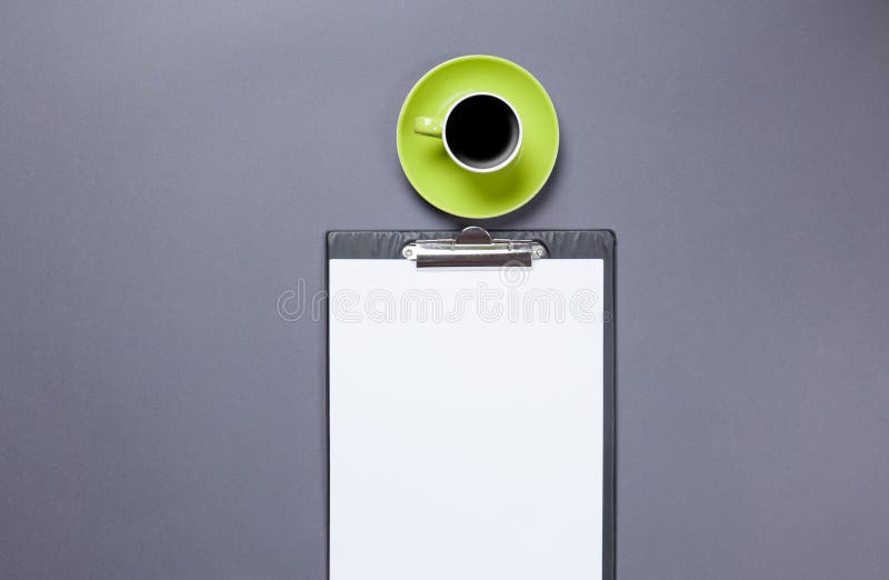 Cup of coffee and business board royalty free stock photography