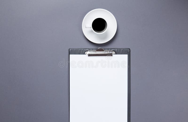 Cup of coffee and business board royalty free stock images