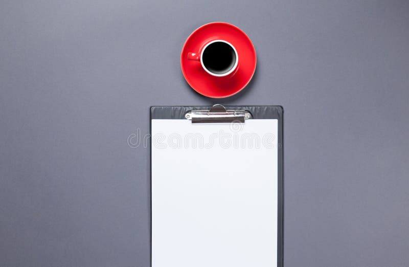 Cup of coffee and business board royalty free stock images