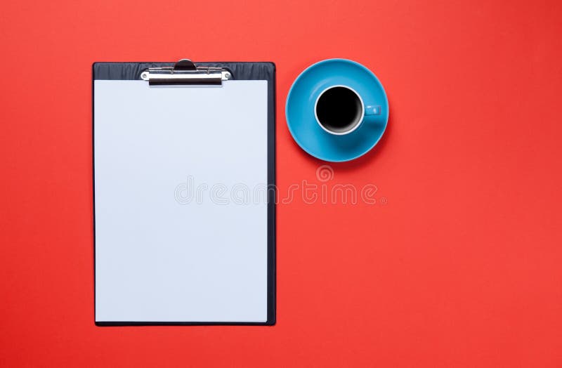 Cup of coffee and business board royalty free stock photo