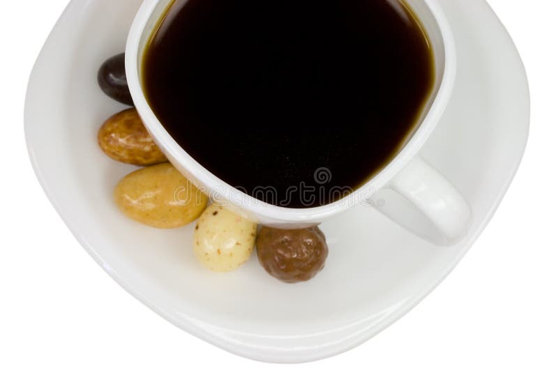 Cup of coffee with candies