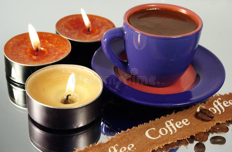 Cup of coffee and candles