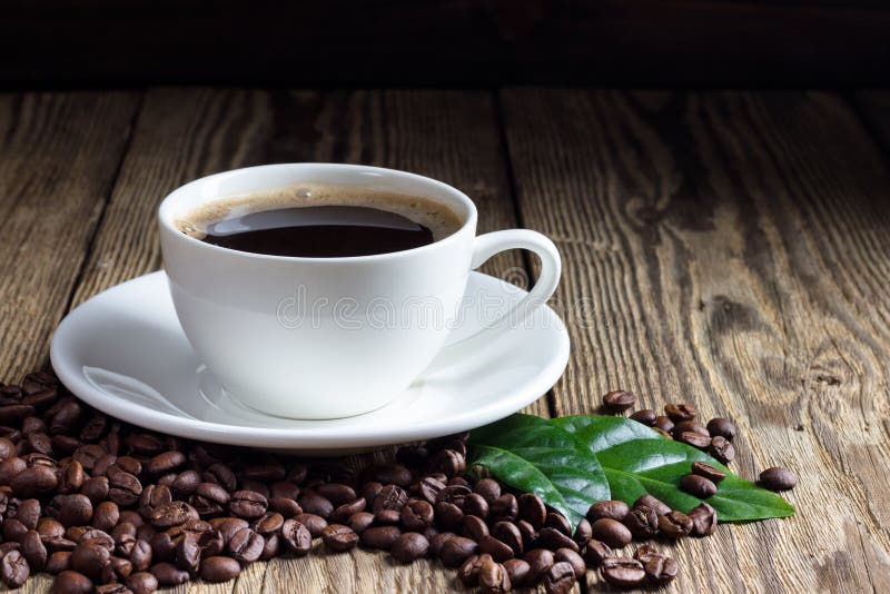 Cup of coffee with coffee beans royalty free stock photography Cup of coffee with coffee beans royalty free stock photography