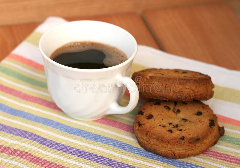 Cup of coffee with cookies stock image. Image of color 31005463