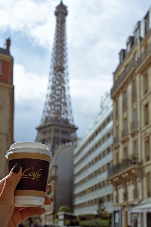 Cup of Coffee and Eiffel Tower Stock Photo Image of travel, hand