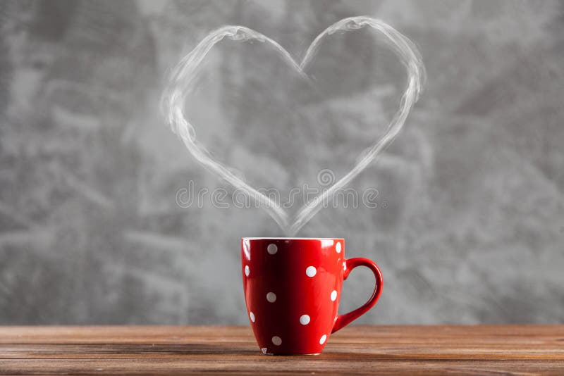 Cup of coffee with a heart shaped steam. Warm steam stock images, royalty-free photos and pictures