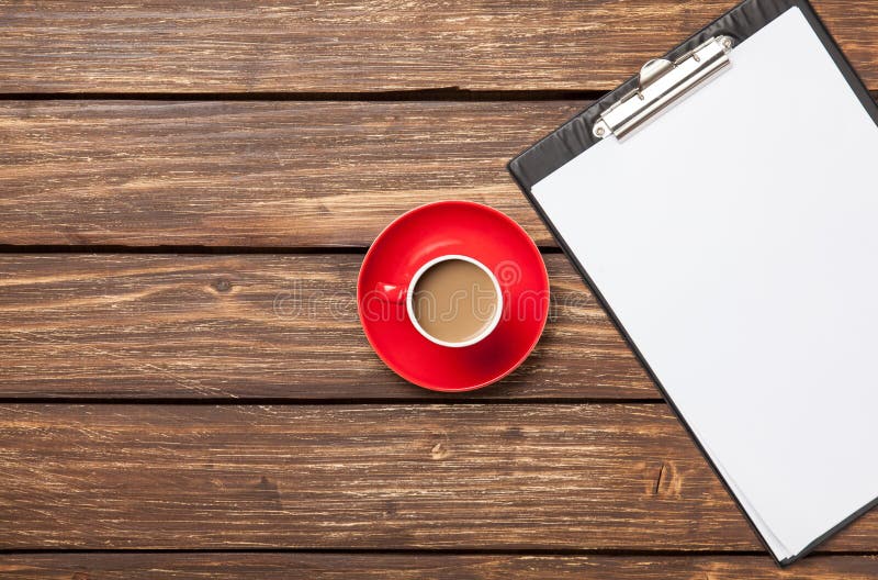 Cup of coffee latte and business tablet royalty free stock image