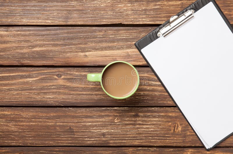 Cup of coffee latte and business tablet royalty free stock photo