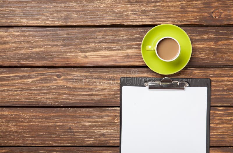 Cup of coffee latte and business tablet stock photos
