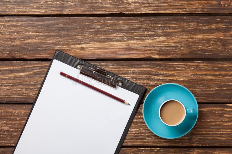 Cup of coffee latte and business tablet royalty free stock image