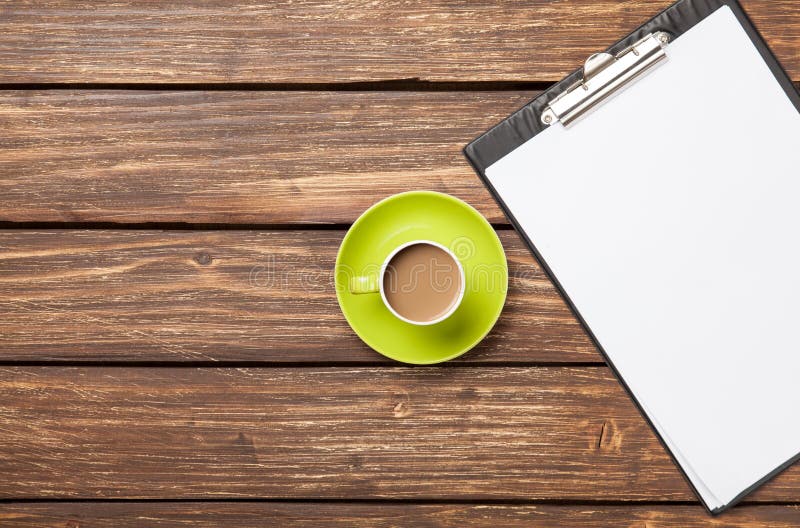 Cup of coffee latte and business tablet royalty free stock photos