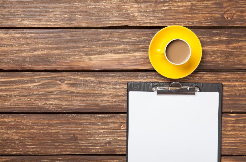 Cup of coffee latte and business tablet royalty free stock images