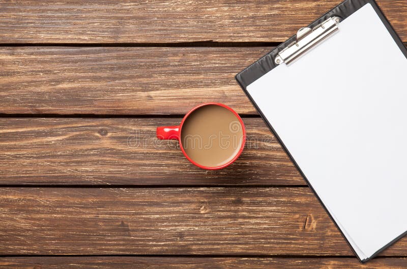 Cup of coffee latte and business tablet royalty free stock images