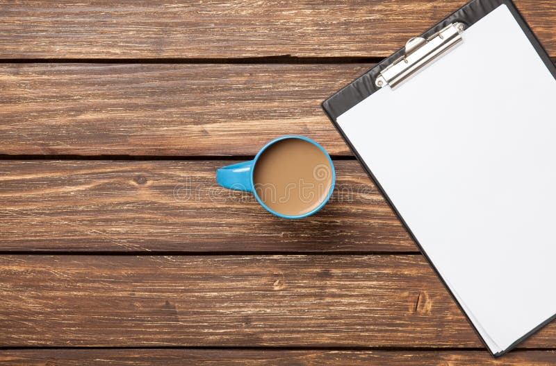 Cup of coffee latte and business tablet royalty free stock images