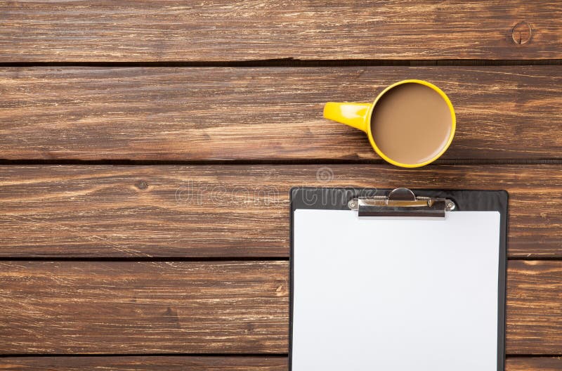 Cup of coffee latte and business tablet stock images