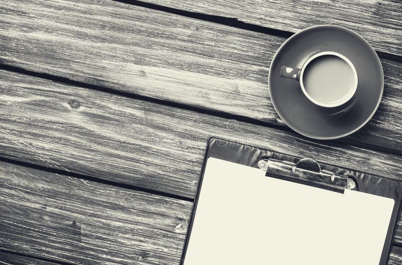 Cup of coffee latte and business tablet stock photography