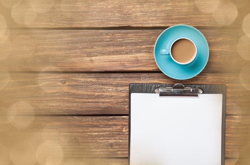 Cup of coffee latte and business tablet stock image