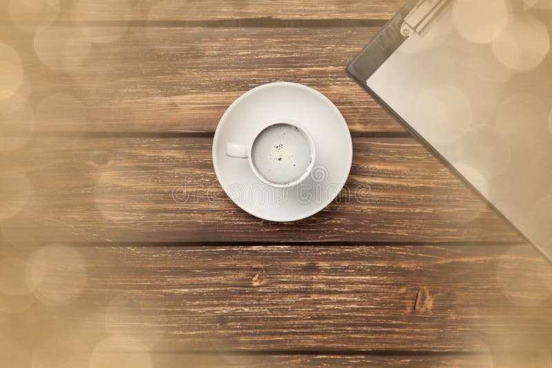 Cup of coffee latte and business tablet stock photography