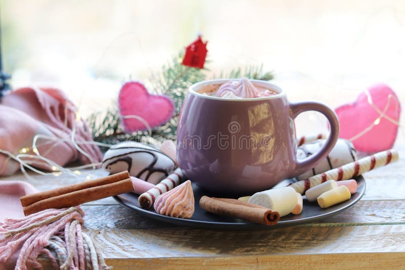 Cup of coffee with meringues and dessert on a plate, Christmas decor, hearts on the windowsill stock photography Cup of coffee with meringues and dessert on a plate, Christmas decor, hearts on the windowsill stock photography