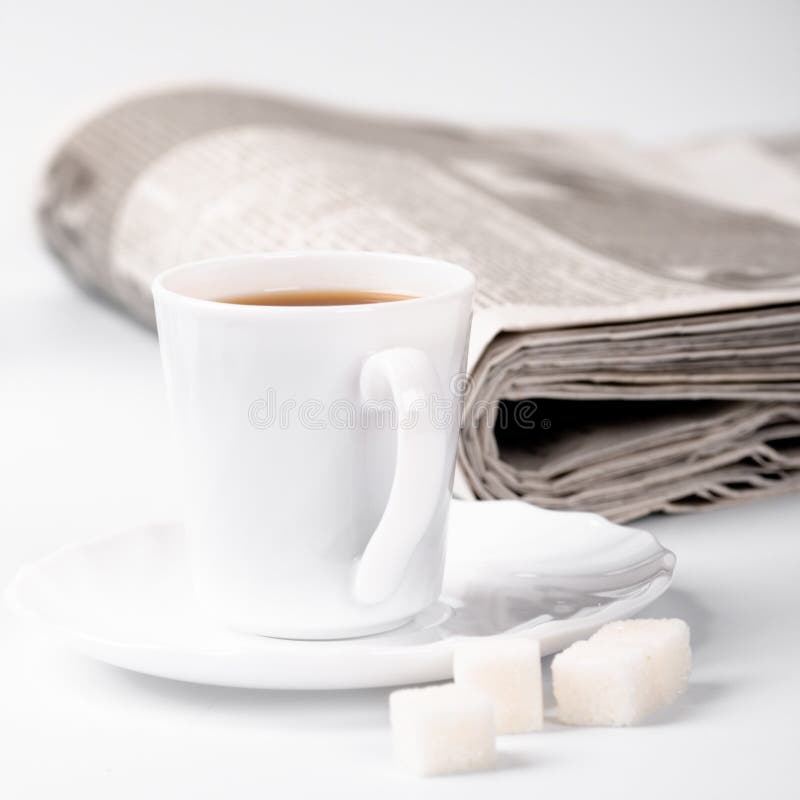 Cup of coffee, sugar and newspapers