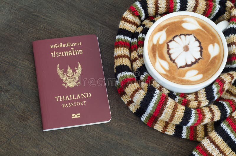 Cup of coffee surrounded the warm scarf stock photo