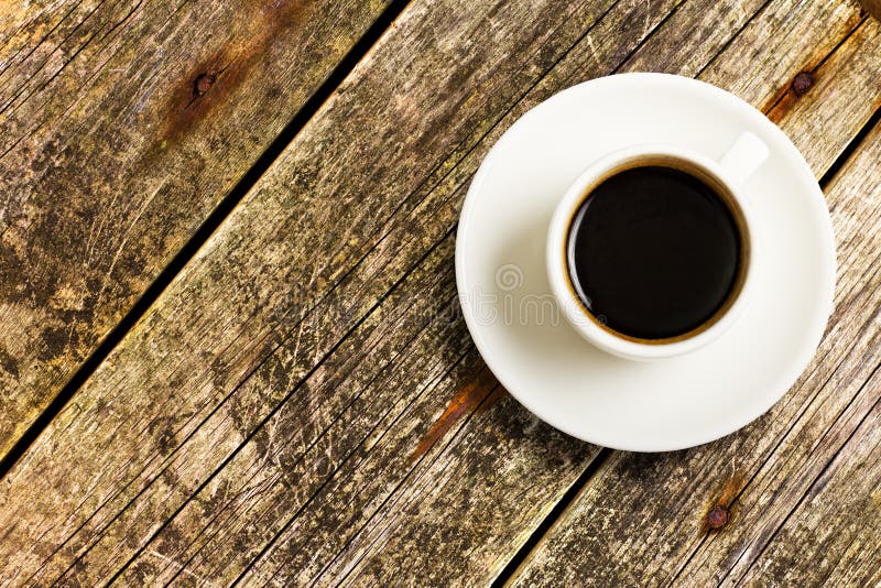 Cup of Coffee on a wood