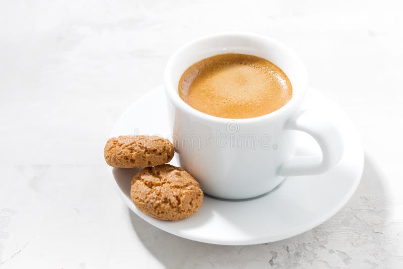 Cup of Espresso and Almond Cookies on a White Table Stock Image Image