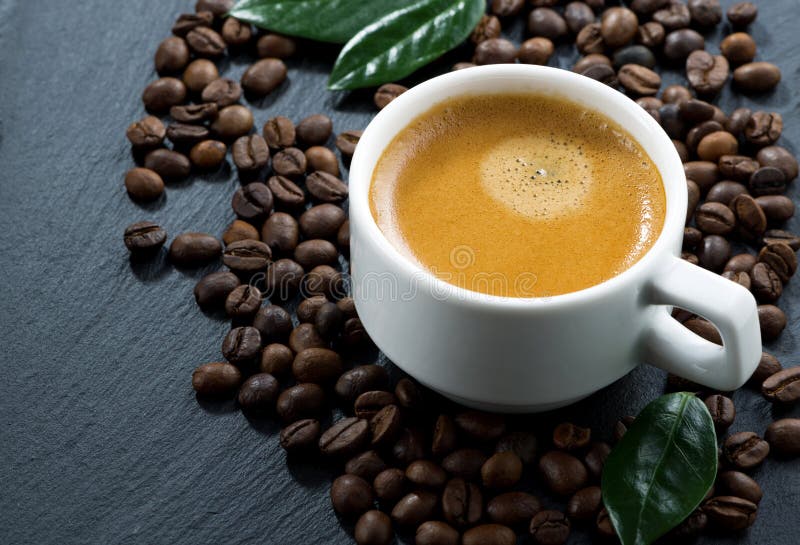 Cup of Espresso on Coffee Beans Background, Horizontal Stock Photo