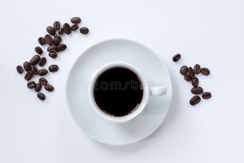 https://thumbs.dreamstime.com/b/cup-espresso-coffee-saucer-coffee-beans-scattered-around-white-background-top-view-close-up-image-cup-espresso-150437642.jpg